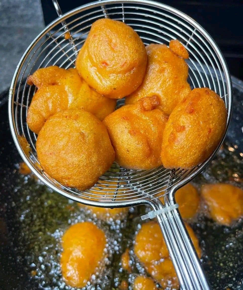 Akara balls frying golden in hot oil